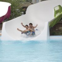 two kids on tube slide at Seascape